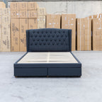 The Amelia Double Fabric Storage Bed - Charcoal available to purchase from Warehouse Furniture Clearance at our next sale event.