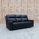 The Anchorage Three Seater Triple Motor Electric Recliner Lounge - Black Leather available to purchase from Warehouse Furniture Clearance at our next sale event.