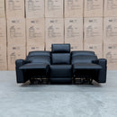 The Anchorage Three Seater Triple Motor Electric Recliner Lounge - Black Leather available to purchase from Warehouse Furniture Clearance at our next sale event.