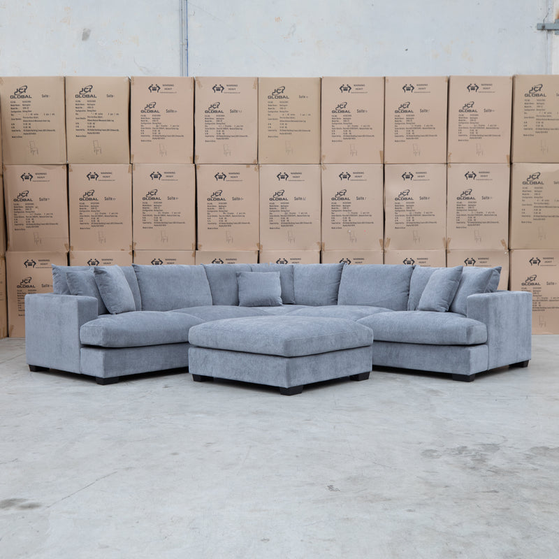 The Ashland Deep Seated Feather & Foam Corner Lounge with Ottoman - Frost available to purchase from Warehouse Furniture Clearance at our next sale event.