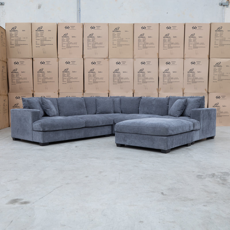 The Ashland Deep Seated Feather & Foam Corner Lounge with Ottoman - Licorice available to purchase from Warehouse Furniture Clearance at our next sale event.