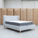 The Aspen Double Upholstered Bed - Light Grey available to purchase from Warehouse Furniture Clearance at our next sale event.