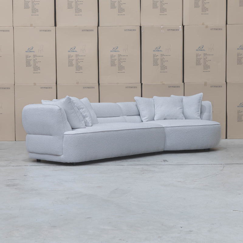The Aspen Curved RHF Chaise Lounge - Cloud available to purchase from Warehouse Furniture Clearance at our next sale event.