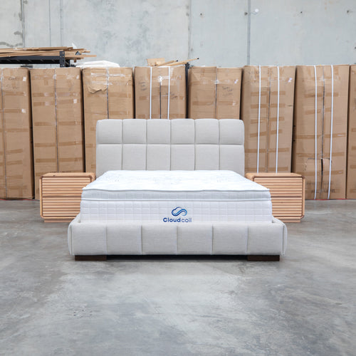 The Bailey Queen Upholstered Bed - Oat White available to purchase from Warehouse Furniture Clearance at our next sale event.
