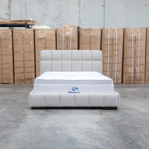 The Bailey King Upholstered Bed - Oat White available to purchase from Warehouse Furniture Clearance at our next sale event.