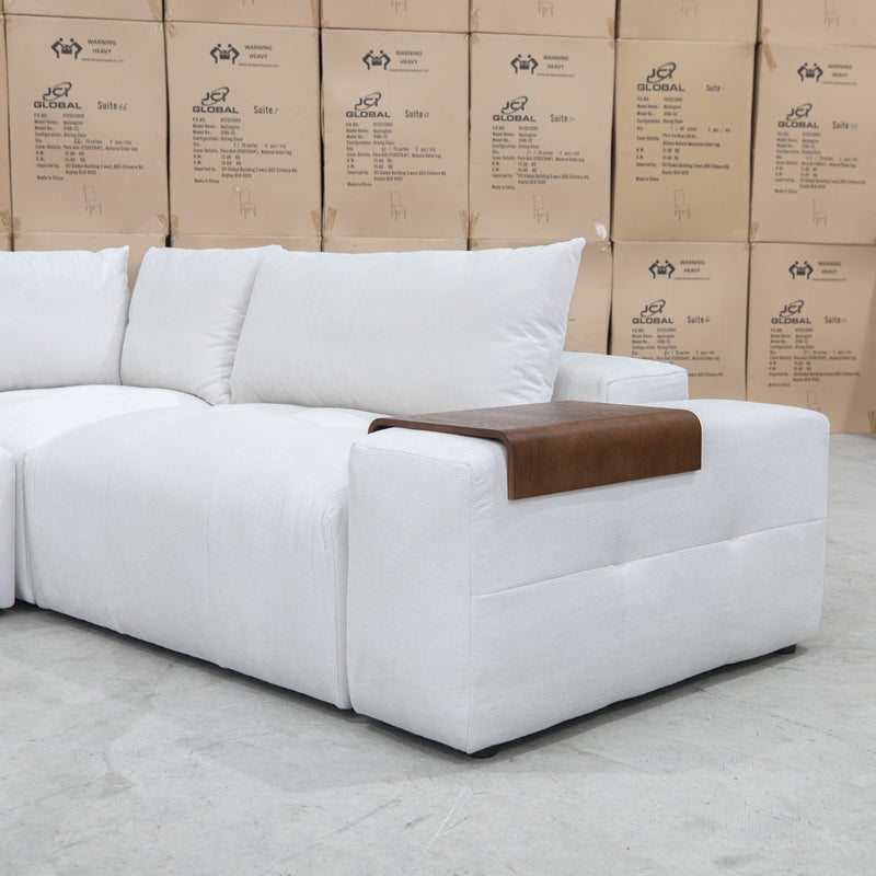 The Barles Modular Corner Lounge with Ottoman - Oat White available to purchase from Warehouse Furniture Clearance at our next sale event.