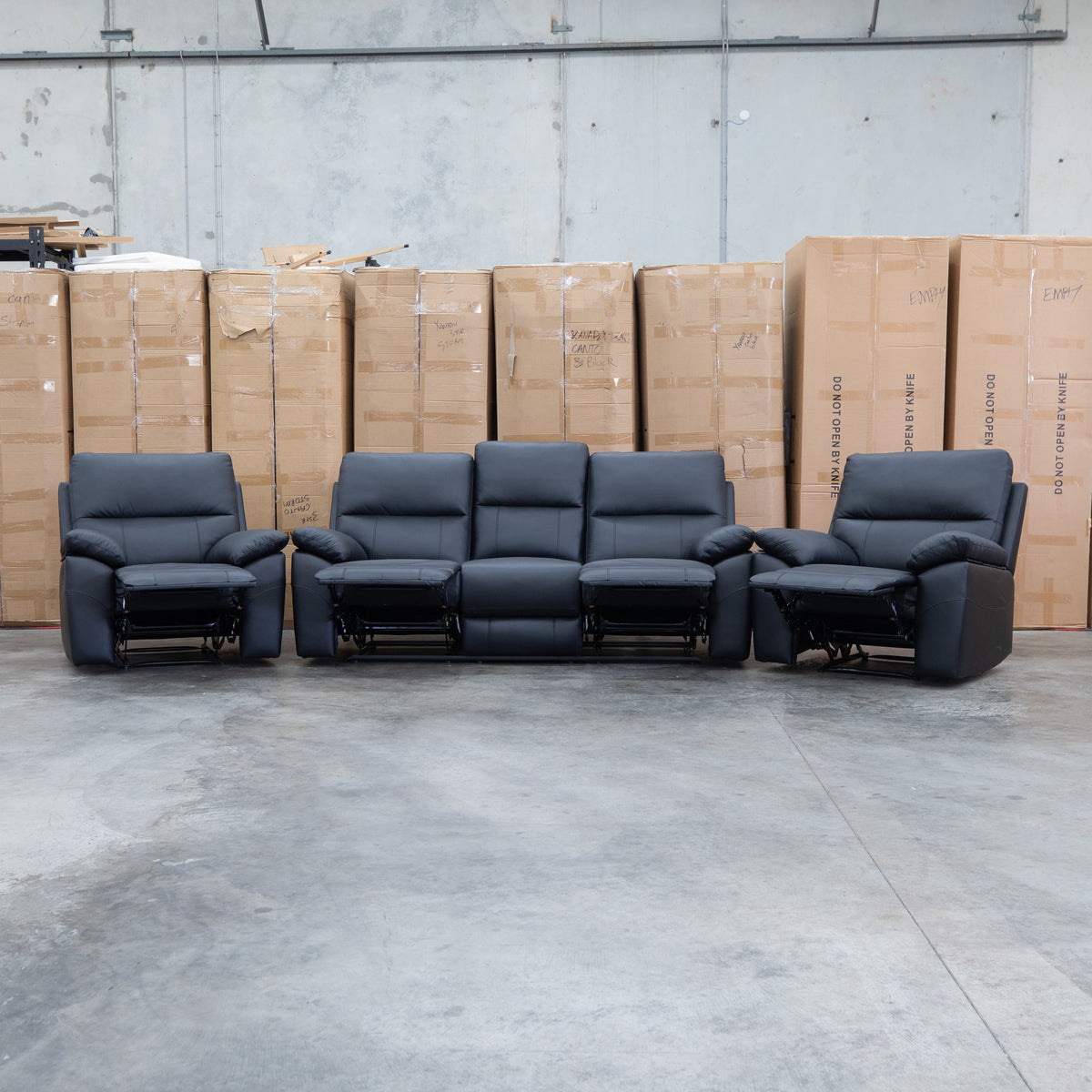 The Bayview Single Manual Leather Recliner - Black available to purchase from Warehouse Furniture Clearance at our next sale event.