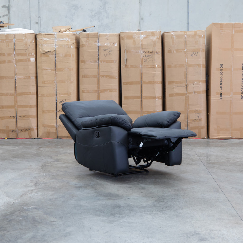 The Bayview Single Manual Leather Recliner - Black available to purchase from Warehouse Furniture Clearance at our next sale event.