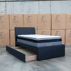 The York King Single Fabric Trundle Bed - Charcoal (Reversible Trundle) available to purchase from Warehouse Furniture Clearance at our next sale event.