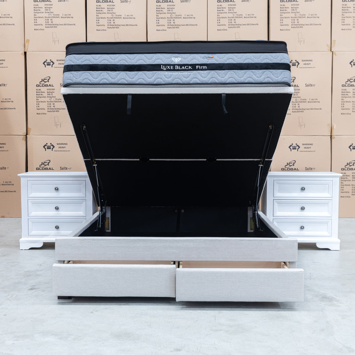 The Hayman Gas Lift & Drawer Storage Queen Bed - Oat White available to purchase from Warehouse Furniture Clearance at our next sale event.