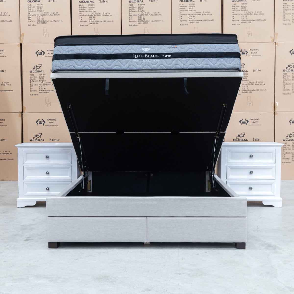The Hayman Gas Lift & Drawer Storage Queen Bed - Oat White available to purchase from Warehouse Furniture Clearance at our next sale event.