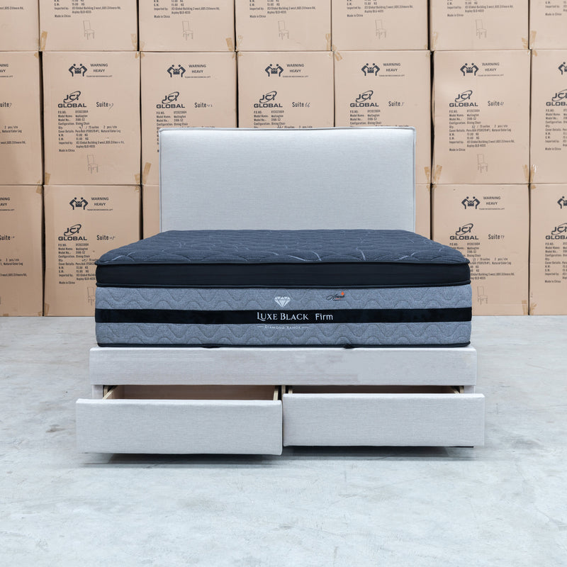 The Hayman Gas Lift & Drawer Storage Queen Bed - Oat White available to purchase from Warehouse Furniture Clearance at our next sale event.