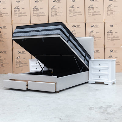 The Hayman Gas Lift & Drawer Storage Queen Bed - Oat White - Available After 13th October available to purchase from Warehouse Furniture Clearance at our next sale event.