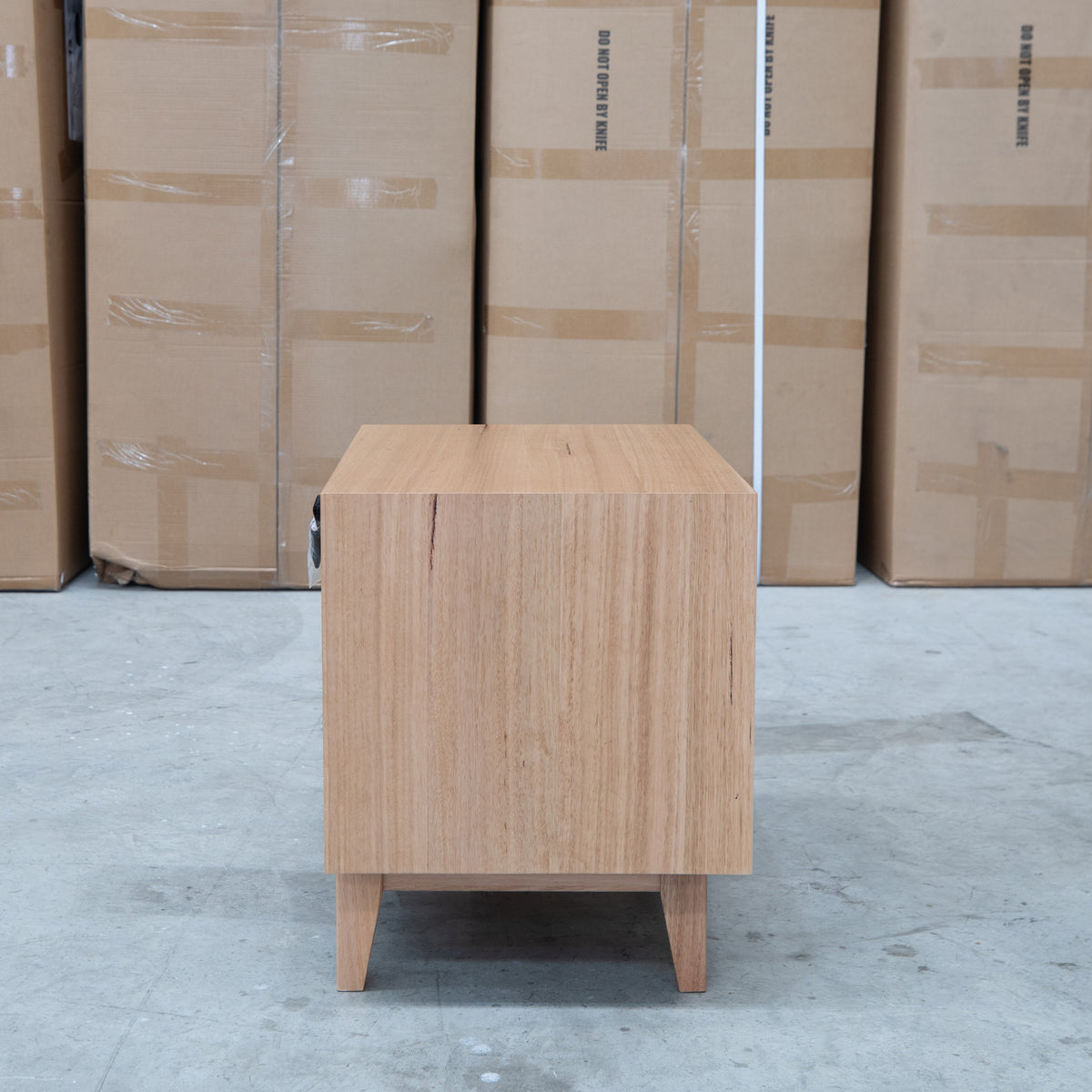 The Urban Two Drawer Australian Messmate Hardwood Bedside available to purchase from Warehouse Furniture Clearance at our next sale event.