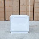 The Aston Two Drawer White Ash Bedside - White available to purchase from Warehouse Furniture Clearance at our next sale event.