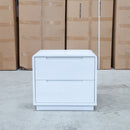 The Aston Two Drawer White Ash Bedside - White available to purchase from Warehouse Furniture Clearance at our next sale event.