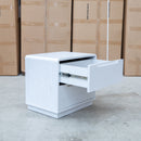 The Aston Two Drawer White Ash Bedside - White available to purchase from Warehouse Furniture Clearance at our next sale event.