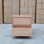 The Nova Two Drawer Australian Messmate Hardwood Bedside available to purchase from Warehouse Furniture Clearance at our next sale event.