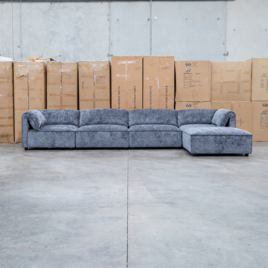 The Bellagio Deep Seat Modular Corner Lounge with Ottoman - Charcoal available to purchase from Warehouse Furniture Clearance at our next sale event.