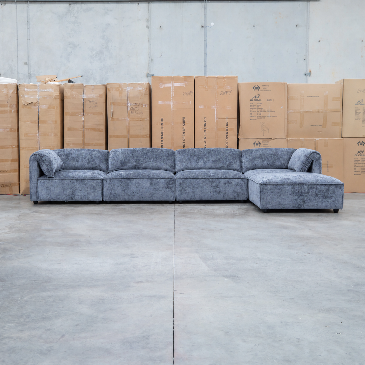 The Bellagio Deep Seat Modular Corner Lounge with Ottoman - Charcoal available to purchase from Warehouse Furniture Clearance at our next sale event.