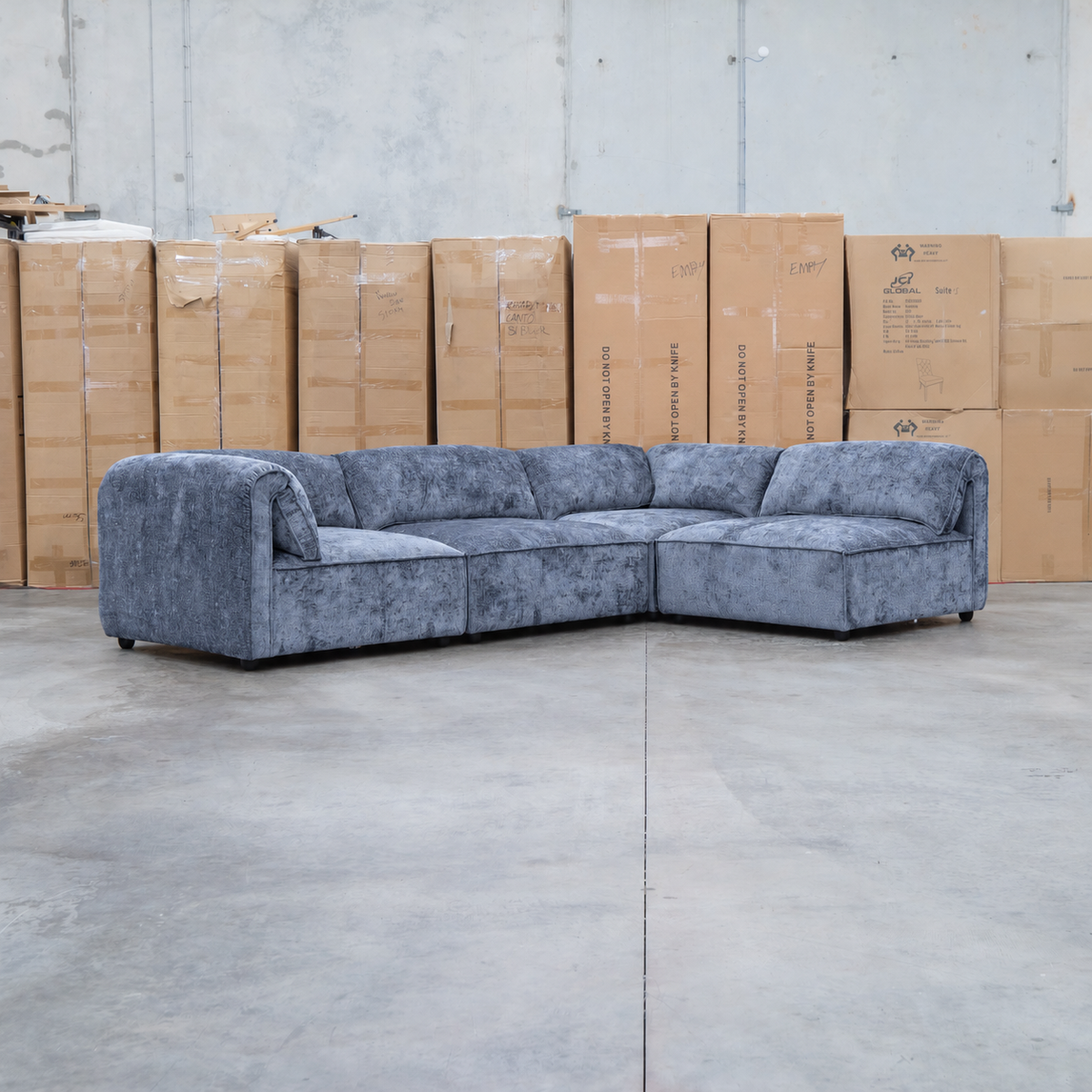 The Bellagio Deep Seat Modular Corner Lounge with Ottoman - Charcoal available to purchase from Warehouse Furniture Clearance at our next sale event.