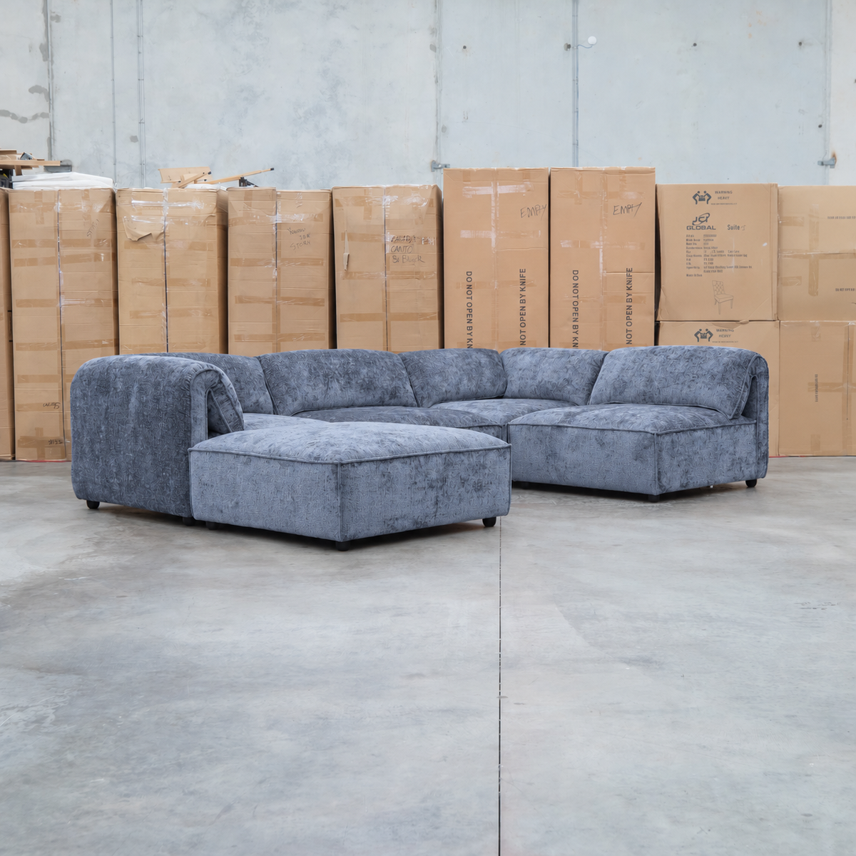 The Bellagio Deep Seat Modular Corner Lounge with Ottoman - Charcoal available to purchase from Warehouse Furniture Clearance at our next sale event.