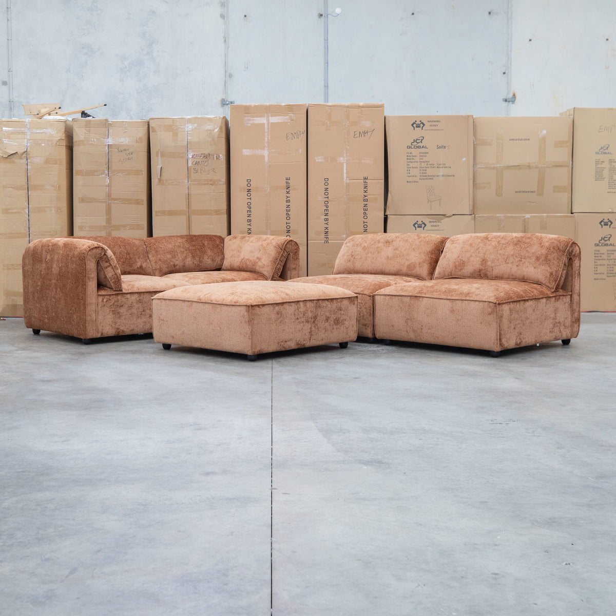 The Bellagio Deep Seat Modular Corner Lounge with Ottoman - Rust available to purchase from Warehouse Furniture Clearance at our next sale event.