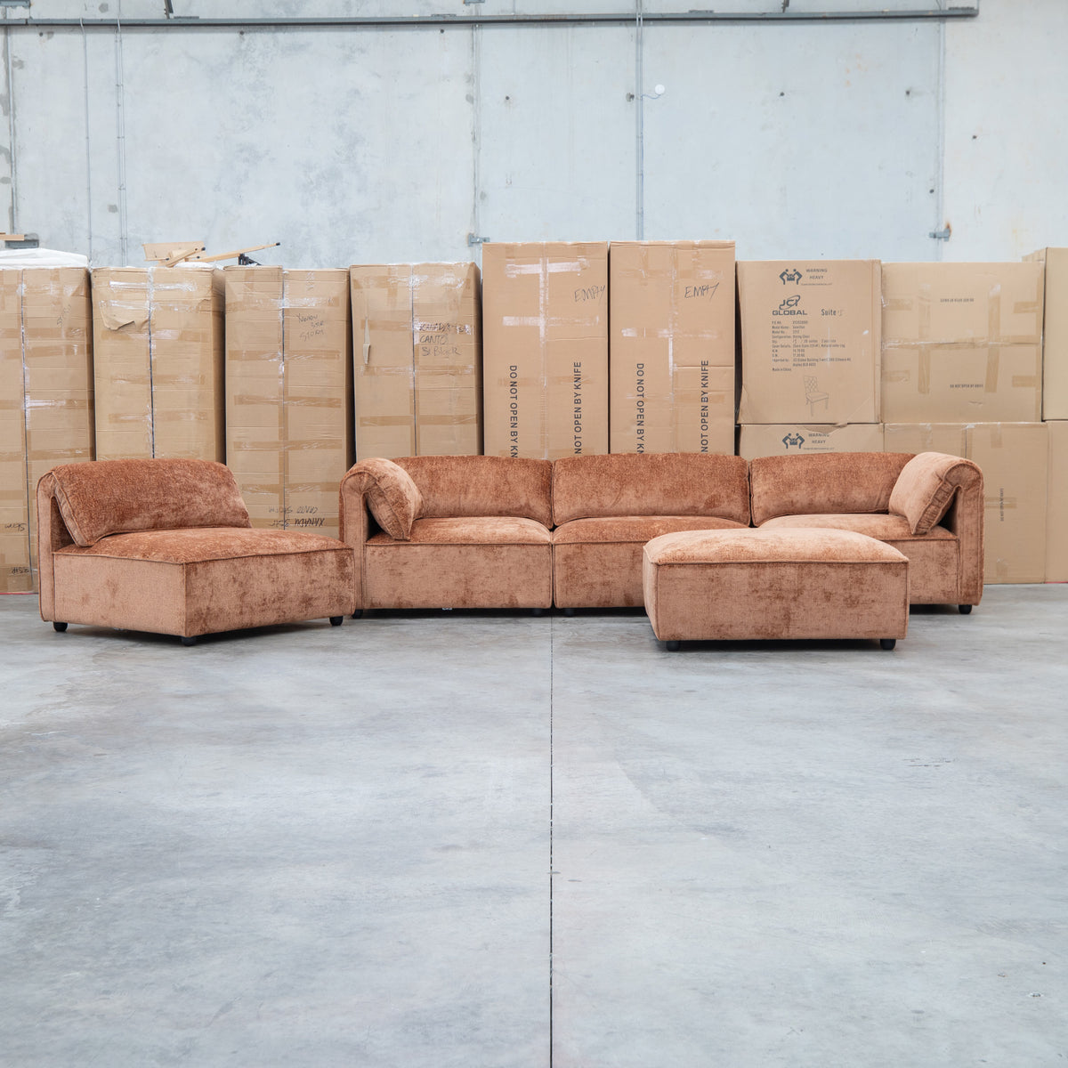 The Bellagio Deep Seat Modular Corner Lounge with Ottoman - Rust available to purchase from Warehouse Furniture Clearance at our next sale event.