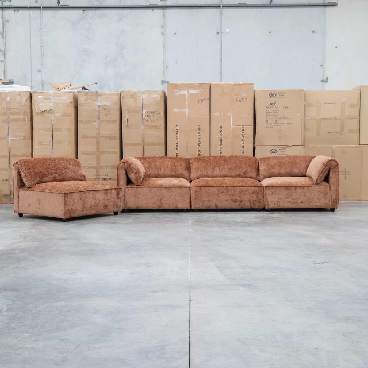 The Bellagio Deep Seat Modular Corner Lounge with Ottoman - Rust available to purchase from Warehouse Furniture Clearance at our next sale event.