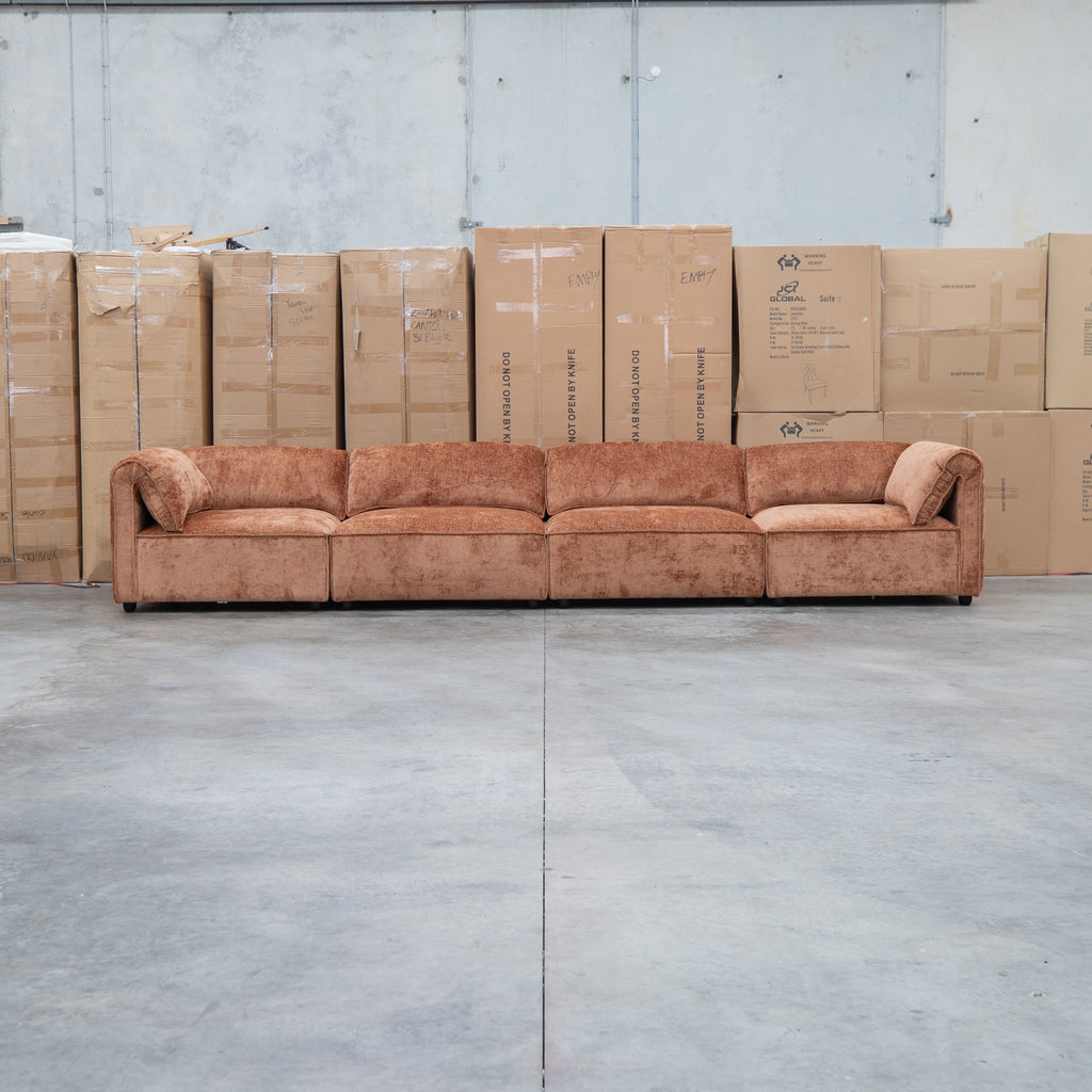 The Bellagio Deep Seat Modular Corner Lounge with Ottoman - Rust available to purchase from Warehouse Furniture Clearance at our next sale event.