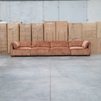 The Bellagio Deep Seat Modular Corner Lounge with Ottoman - Rust available to purchase from Warehouse Furniture Clearance at our next sale event.