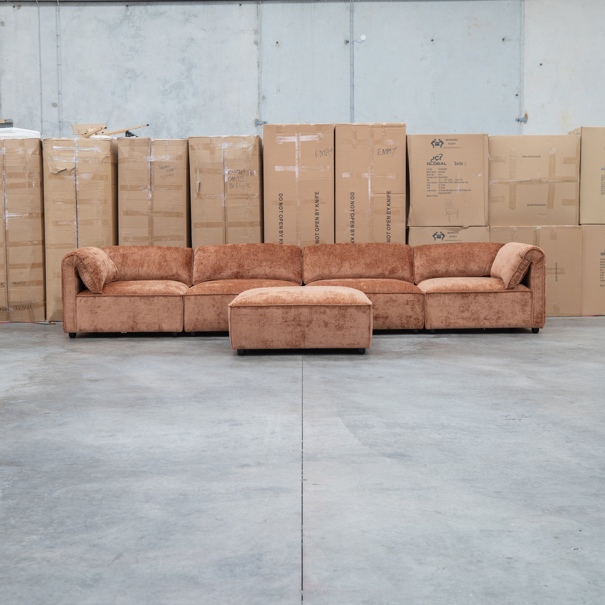 The Bellagio Deep Seat Modular Corner Lounge with Ottoman - Rust available to purchase from Warehouse Furniture Clearance at our next sale event.