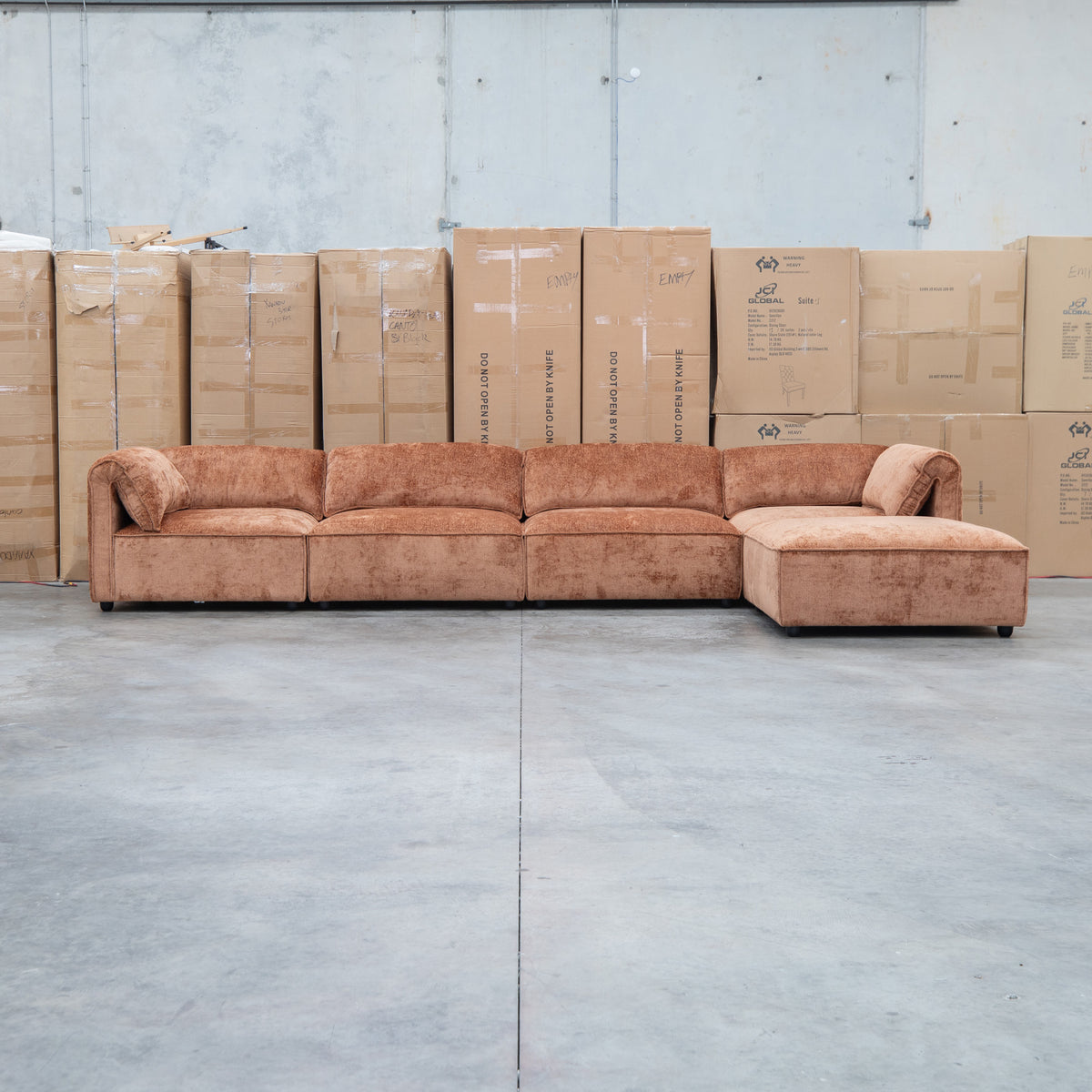 The Bellagio Deep Seat Modular Corner Lounge with Ottoman - Rust available to purchase from Warehouse Furniture Clearance at our next sale event.