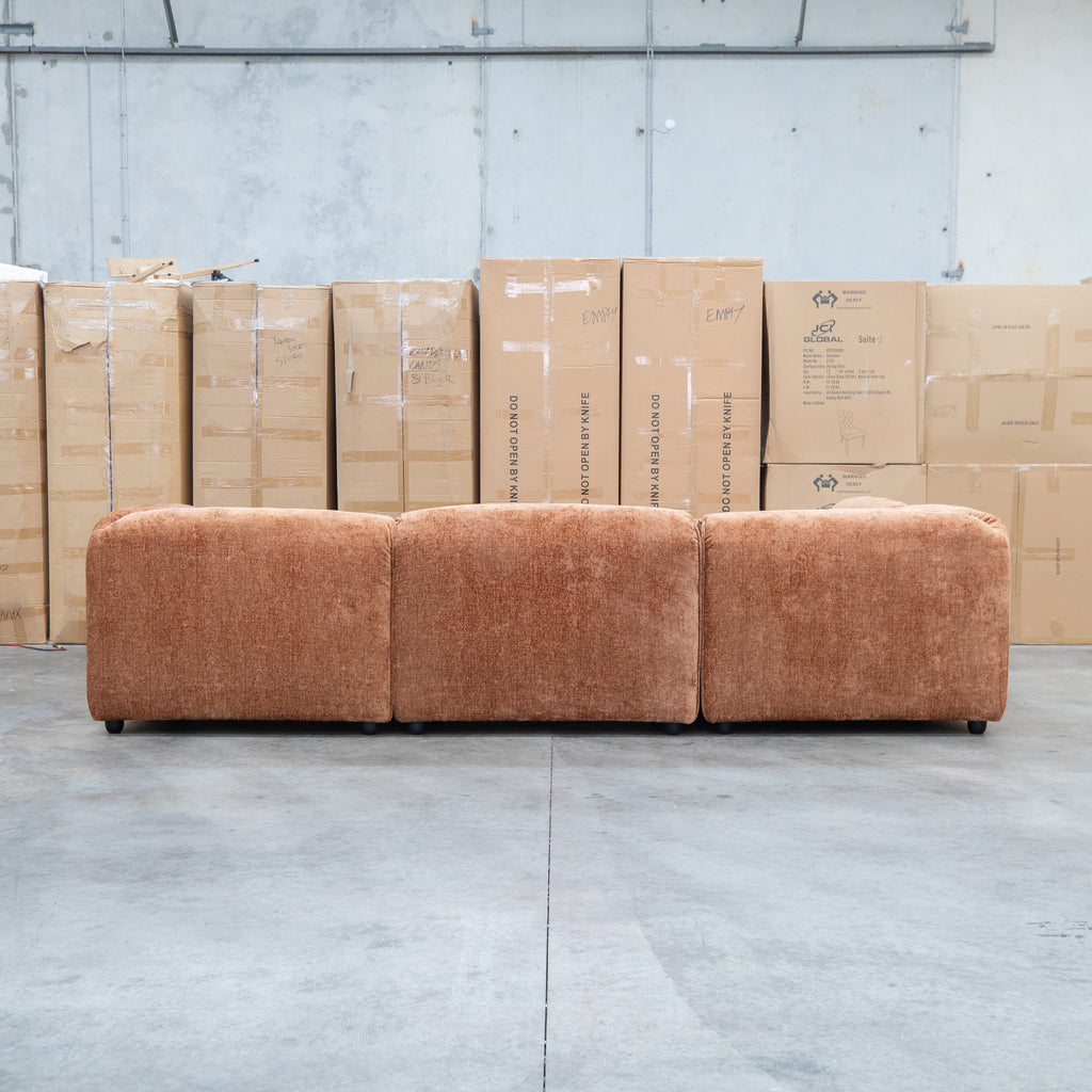 The Bellagio Deep Seat Modular Corner Lounge with Ottoman - Rust available to purchase from Warehouse Furniture Clearance at our next sale event.