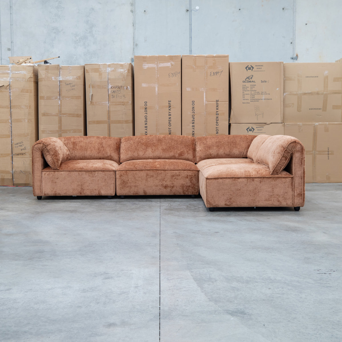 The Bellagio Deep Seat Modular Corner Lounge with Ottoman - Rust available to purchase from Warehouse Furniture Clearance at our next sale event.