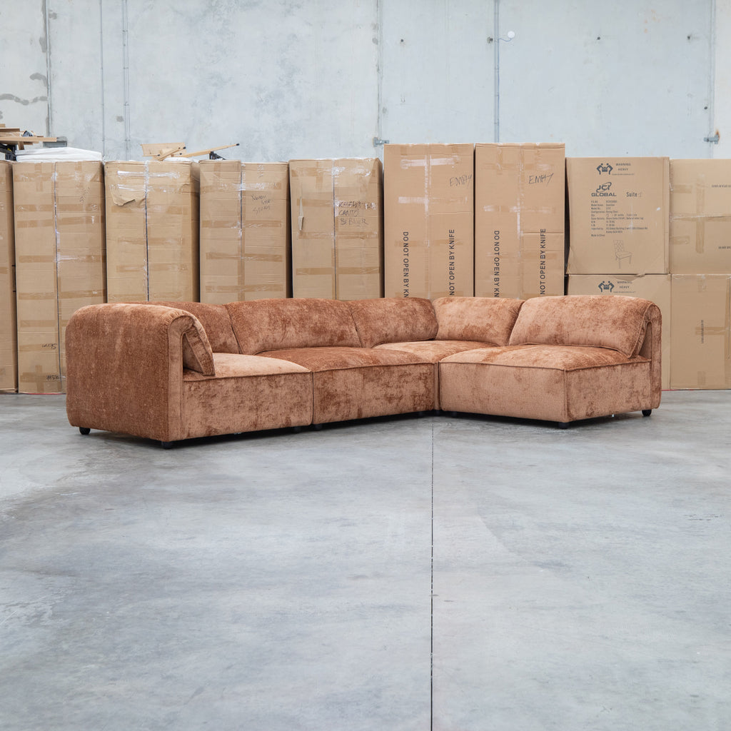 The Bellagio Deep Seat Modular Corner Lounge with Ottoman - Rust available to purchase from Warehouse Furniture Clearance at our next sale event.