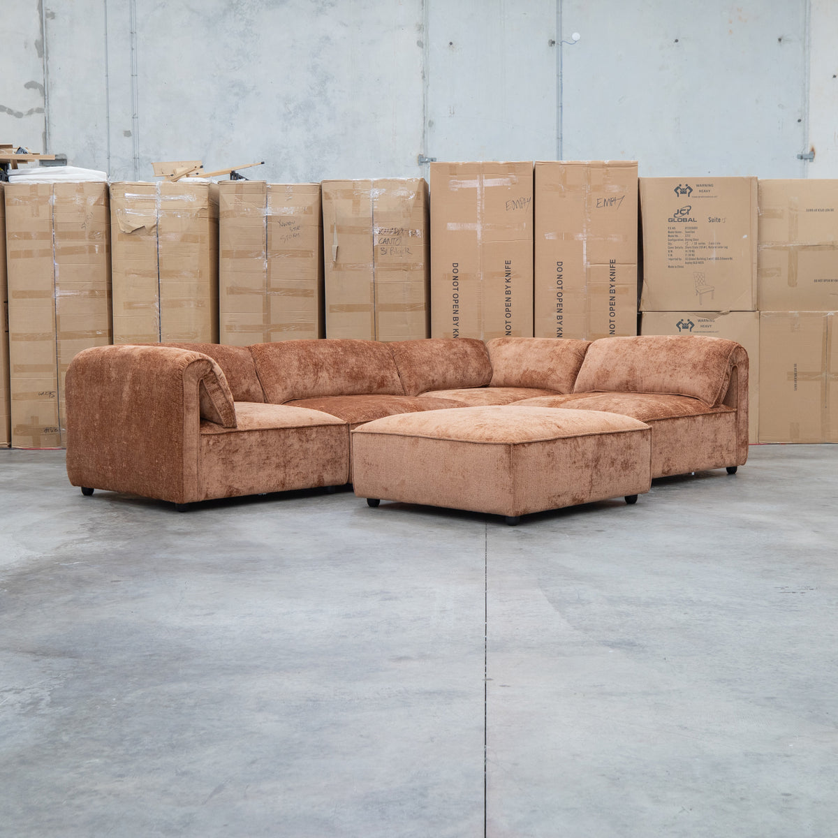 The Bellagio Deep Seat Modular Corner Lounge with Ottoman - Rust available to purchase from Warehouse Furniture Clearance at our next sale event.
