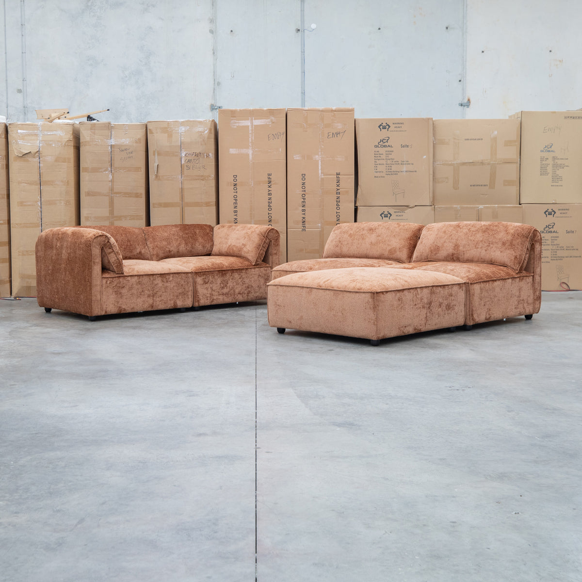 The Bellagio Deep Seat Modular Corner Lounge with Ottoman - Rust available to purchase from Warehouse Furniture Clearance at our next sale event.