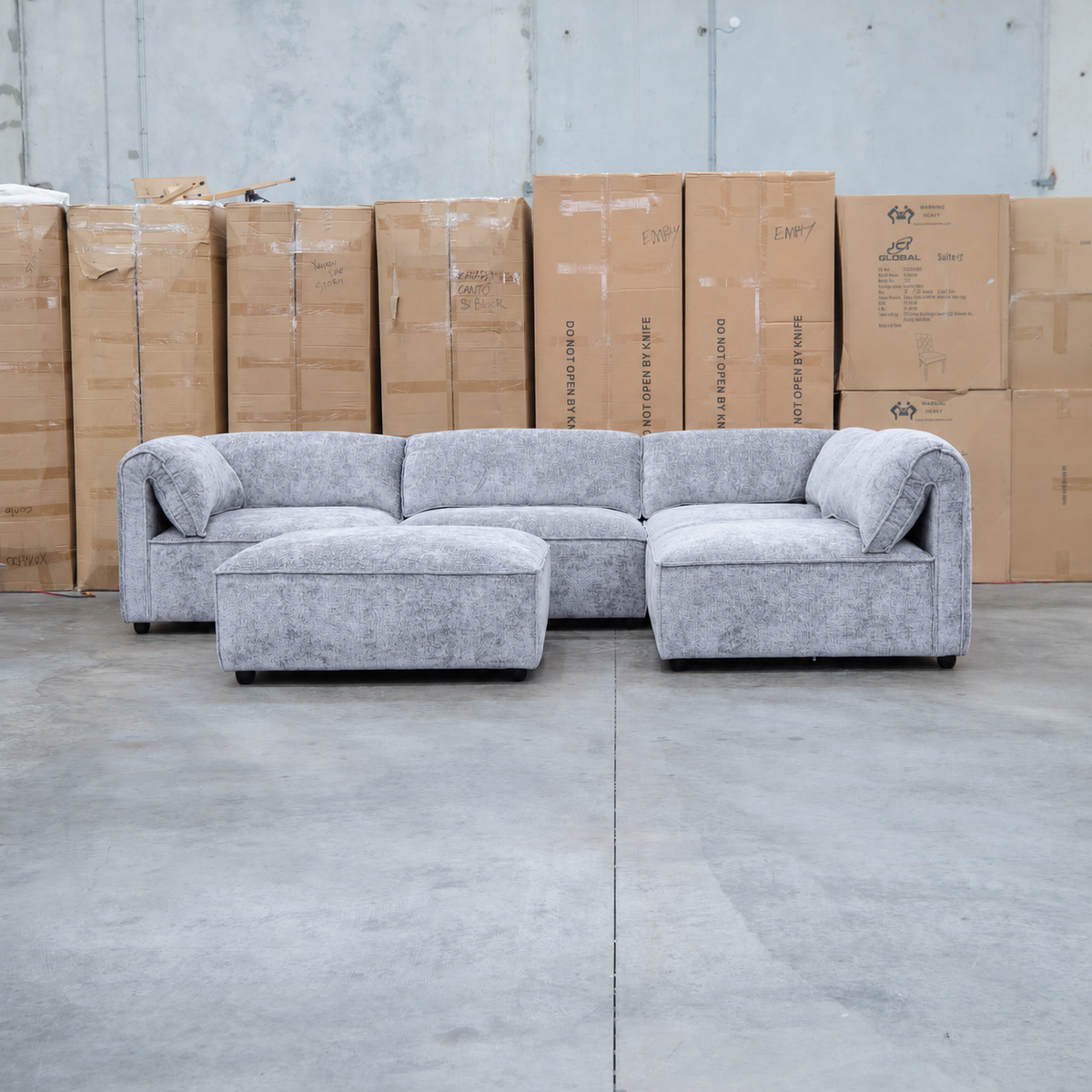 The Bellagio Deep Seat Modular Corner Lounge with Ottoman - Slate available to purchase from Warehouse Furniture Clearance at our next sale event.