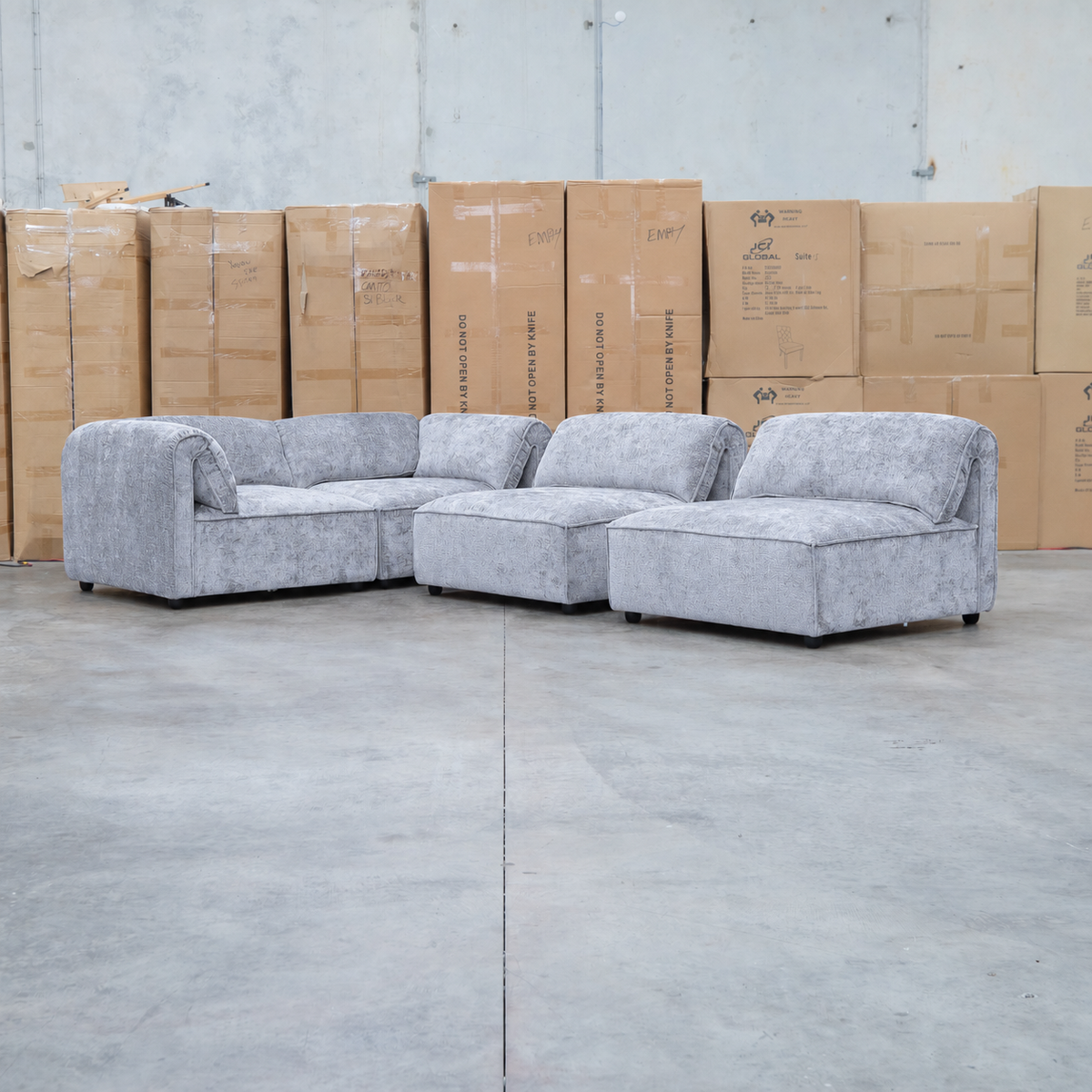 The Bellagio Deep Seat Modular Corner Lounge with Ottoman - Slate available to purchase from Warehouse Furniture Clearance at our next sale event.