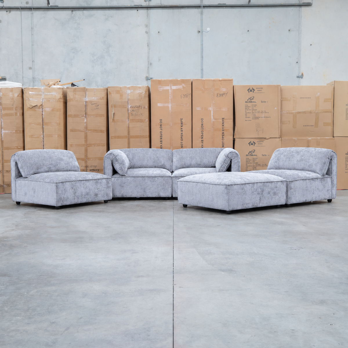 The Bellagio Deep Seat Modular Corner Lounge with Ottoman - Slate available to purchase from Warehouse Furniture Clearance at our next sale event.