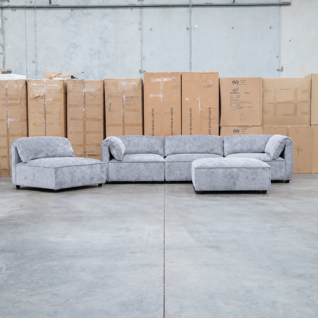 The Bellagio Deep Seat Modular Corner Lounge with Ottoman - Slate available to purchase from Warehouse Furniture Clearance at our next sale event.