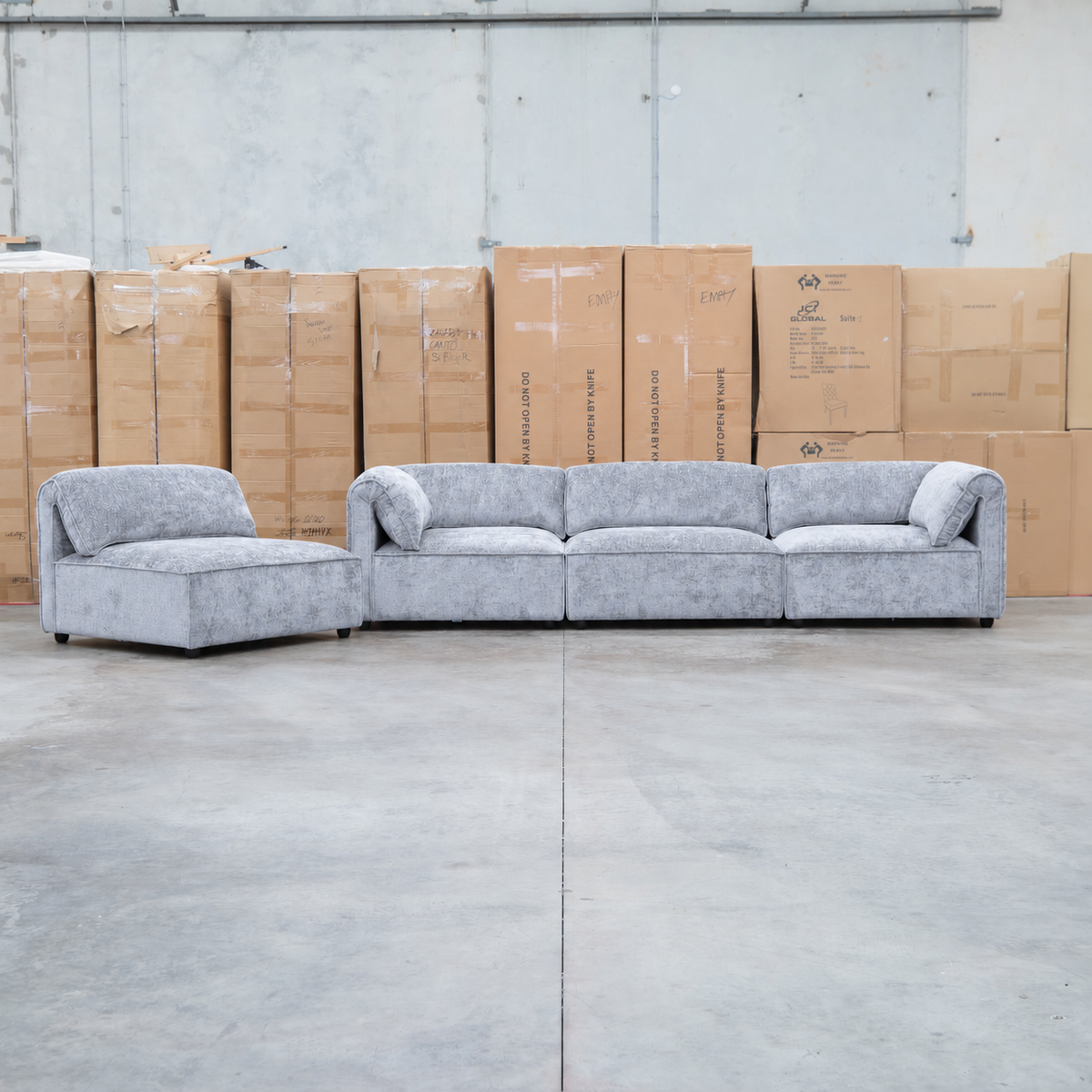 The Bellagio Deep Seat Modular Corner Lounge with Ottoman - Slate available to purchase from Warehouse Furniture Clearance at our next sale event.