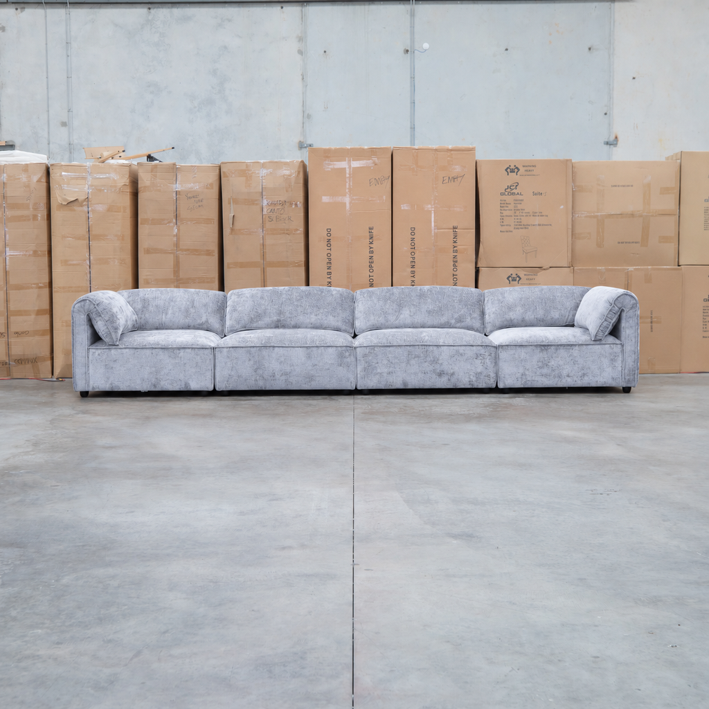 The Bellagio Deep Seat Modular Corner Lounge with Ottoman - Slate available to purchase from Warehouse Furniture Clearance at our next sale event.