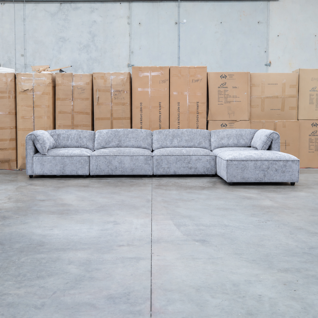 The Bellagio Deep Seat Modular Corner Lounge with Ottoman - Slate available to purchase from Warehouse Furniture Clearance at our next sale event.
