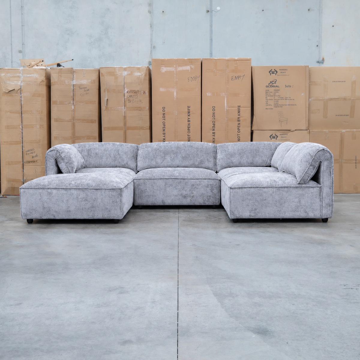 The Bellagio Deep Seat Modular Corner Lounge with Ottoman - Slate available to purchase from Warehouse Furniture Clearance at our next sale event.