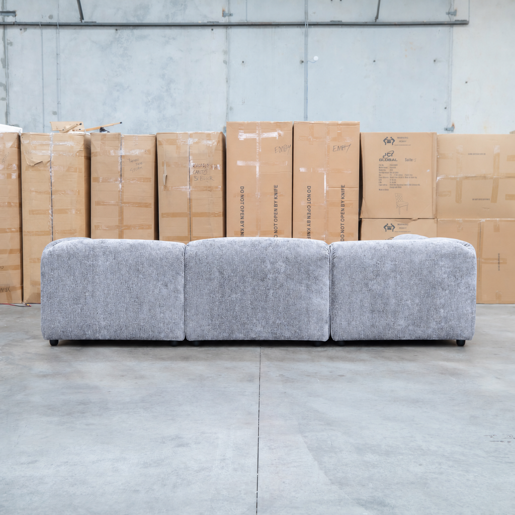 The Bellagio Deep Seat Modular Corner Lounge with Ottoman - Slate available to purchase from Warehouse Furniture Clearance at our next sale event.
