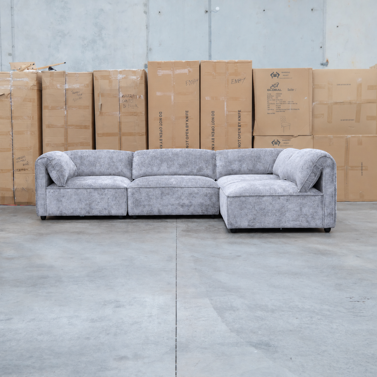 The Bellagio Deep Seat Modular Corner Lounge with Ottoman - Slate available to purchase from Warehouse Furniture Clearance at our next sale event.