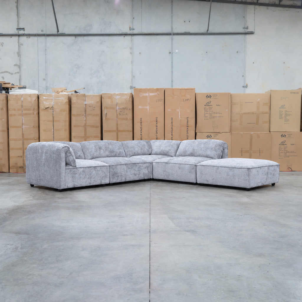 The Bellagio Deep Seat Modular Corner Lounge with Ottoman - Slate available to purchase from Warehouse Furniture Clearance at our next sale event.