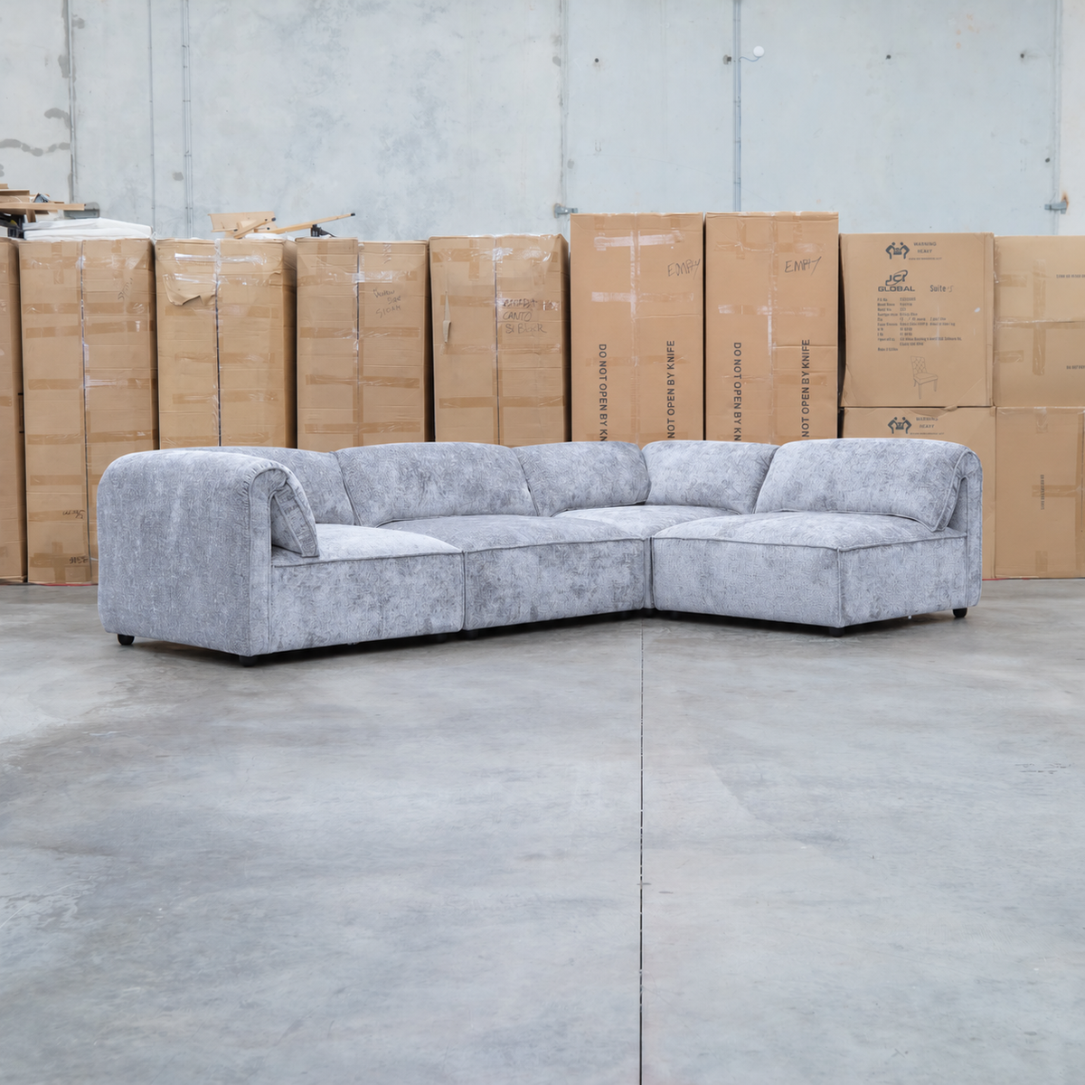 The Bellagio Deep Seat Modular Corner Lounge with Ottoman - Slate available to purchase from Warehouse Furniture Clearance at our next sale event.